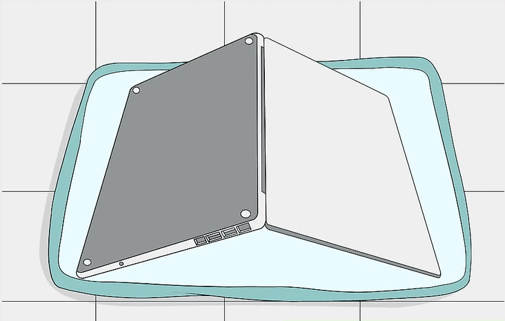 Đặt laptop úp trên bề mặt phẳng lót khăn